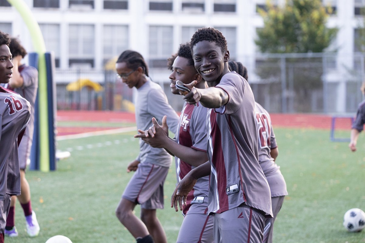 Soccer players celebrating on the field